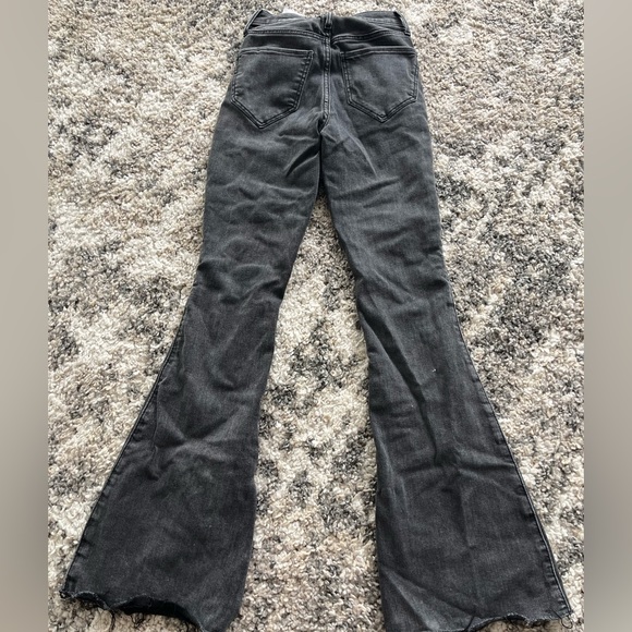 Black Hollister Flare Jeans, with a slit on the inside of the leg. - Picture 2 of 3